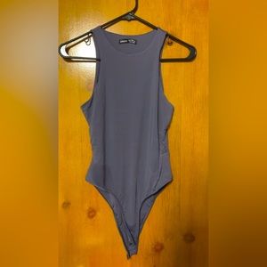 Grayish-blue tank top body suit.